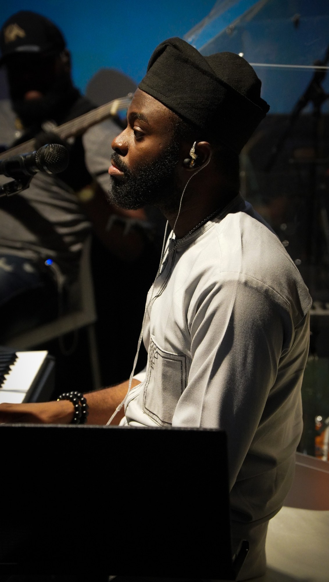 A musician plays a keyboard during Sunday worship.