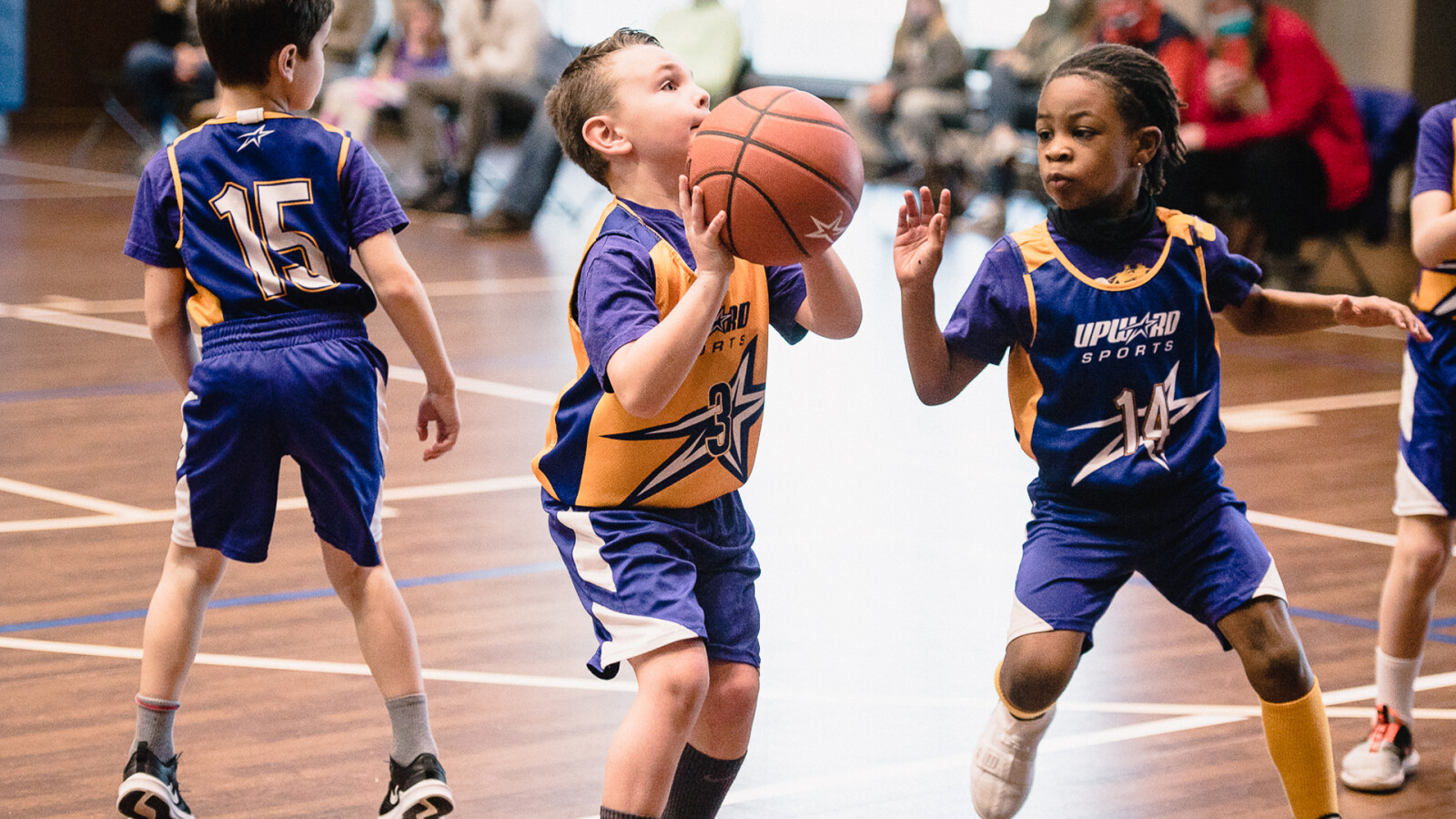Coach teaching basketball fundamentals